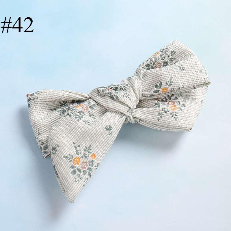 Hot sale small print flower and fresh style bowknot hair clip ch